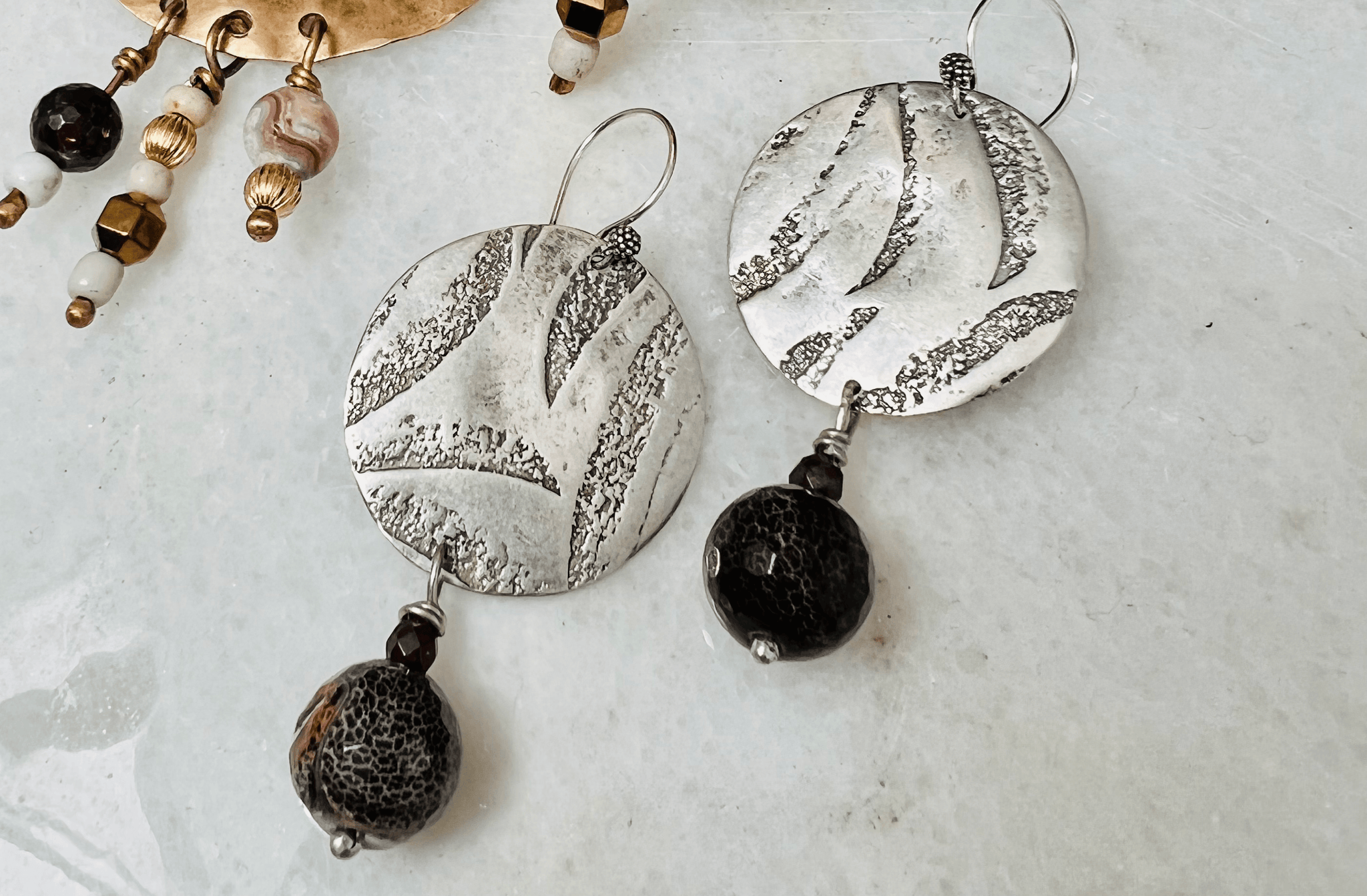 Sterling Elegance:  Textured Silver Earrings with Agate Drops