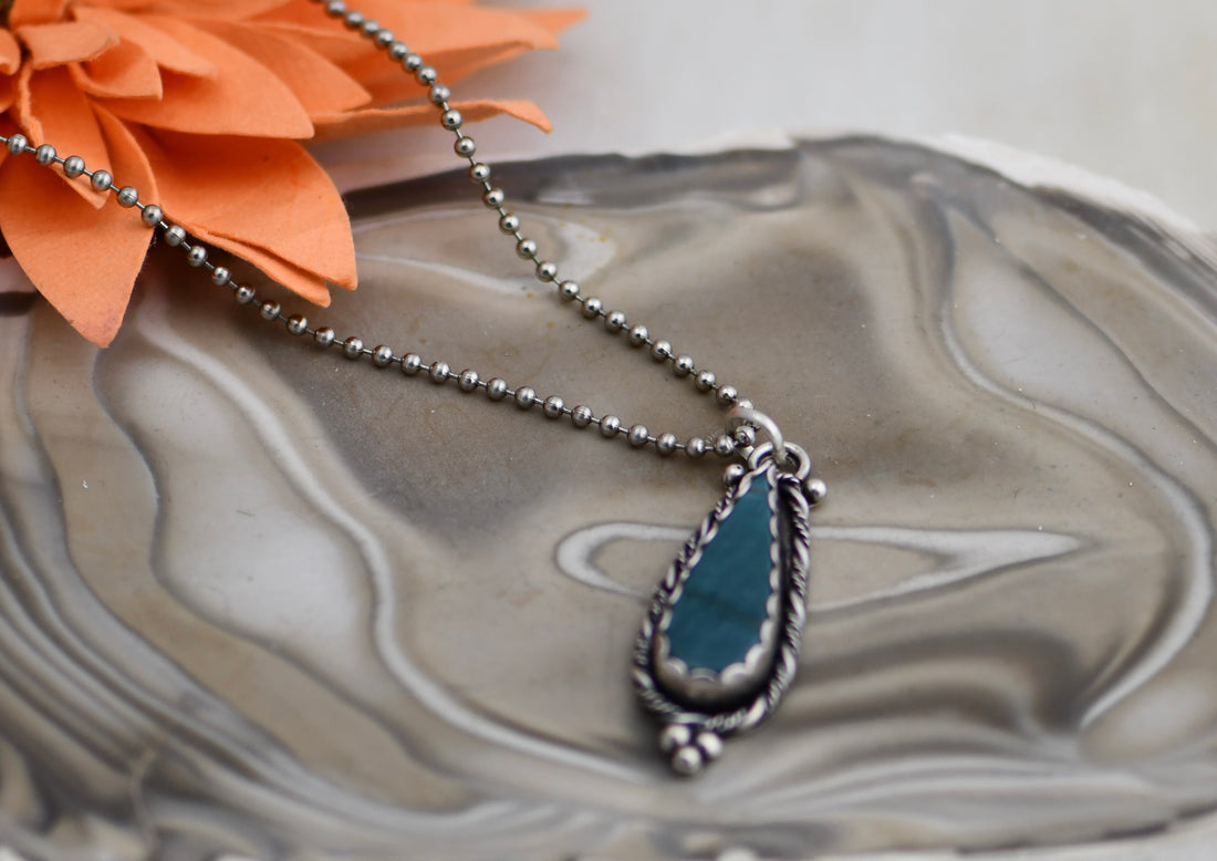 Ocean Elegance: Sterling Silver Blue Agate Pendant with an elegant sterling chain