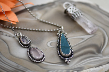 Ocean Elegance: Sterling Silver Blue Agate Pendant with an elegant sterling chain