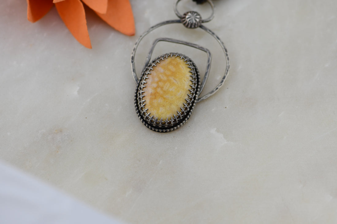 Handcrafted Fossil Coral Pendant with Sterling Silver Accents