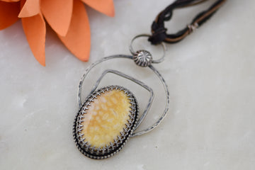 Handcrafted Fossil Coral Pendant with Sterling Silver Accents